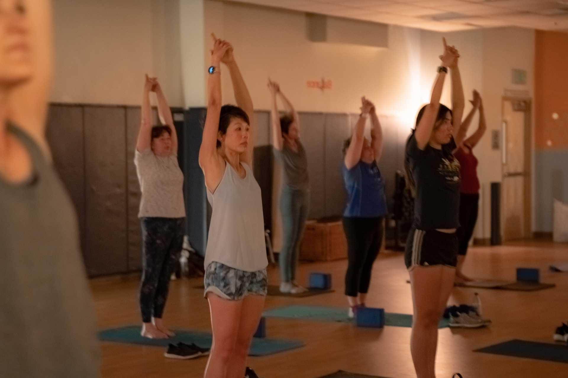 Yoga class in standing pose